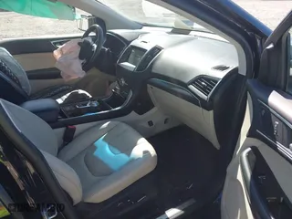 2019 Ford Edge Titanium with VIN 2FMPK3K99KBB53558, listed as a IAAI auction lot 41830328 with 95,480 mi miles. Bid and sale history available at carsss.com. Image 5.