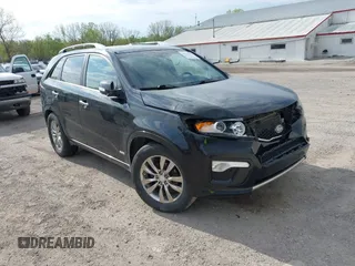 2012 Kia Sorento SX z VIN 5XYKWDA25CG219789, wystawiony jako IAAI lot #42124634 z przebiegiem 155 397 mil mil oraz . Historia ofert i sprzedaży dostępna na DreamBid. Obrazek 1.