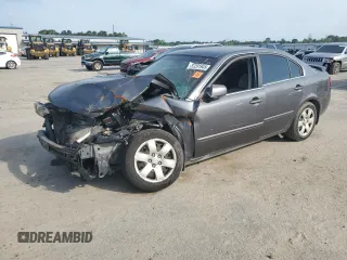 2007 Kia Optima LX z VIN KNAGE123775156768, wystawiony jako Copart lot #57291945 z przebiegiem Nie podano mil oraz Szkoda całkowita • Salvage title. Historia ofert i sprzedaży dostępna na DreamBid. Obrazek 1.