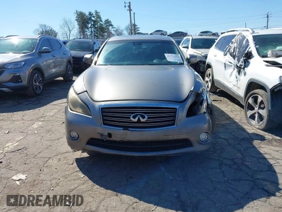 2012 Infiniti M with VIN JN1BY1AP3CM331819, listed as a IAAI auction lot 41773311 with 321,644 mi miles and . Bid and sale history available at DreamBid. Image 12.