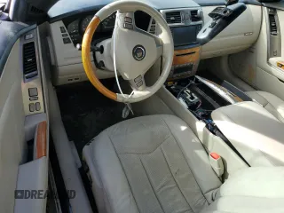 2006 Cadillac XLR z VIN 1G6YV36A965600309, wystawiony jako Copart lot #73937584 z przebiegiem Nie podano mil oraz Szkody całkowita. Historia ofert i sprzedaży dostępna na DreamBid. Obrazek 8.