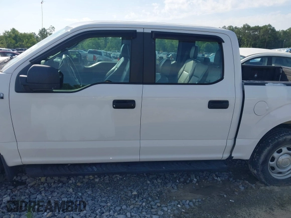 2019 Ford F-150 XL with VIN 1FTEW1CB3KKD58854, listed as a IAAI auction lot 42119966 with 91,198 mi miles and . Bid and sale history available at DreamBid. Image 14.