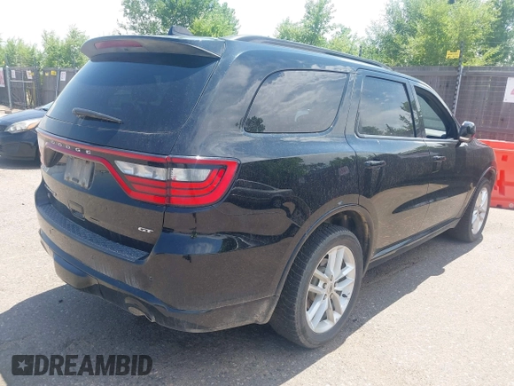 2023 Dodge Durango GT Plus with VIN 1C4RDJDGXPC688087, listed as a IAAI auction lot 42685018 with 58,999 mi miles and . Bid and sale history available at DreamBid. Image 4.