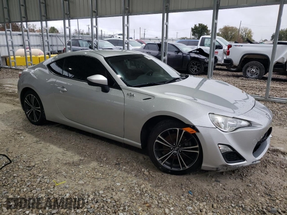 2013 Scion FR-S with VIN JF1ZNAA10D1700449, listed as a Copart auction lot 79005134 with 119,968 mi miles and Salvage Title. Bid and sale history available at DreamBid. Image 4.