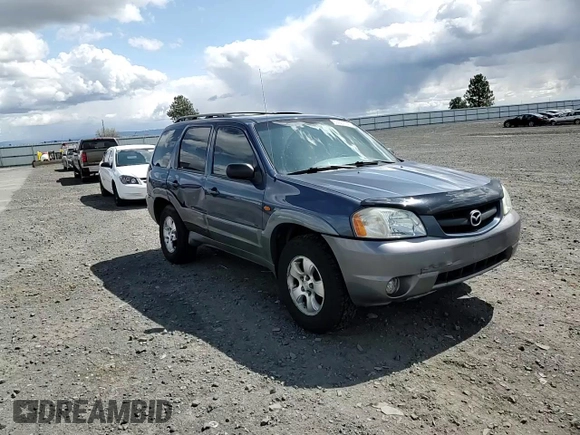 2001 Mazda Tribute LX with VIN 4F2CU08101KM29823, listed as a Copart auction lot 53857145 with 187,710 mi miles and Salvage Title. Bid and sale history available at carsss.com. Image 14.