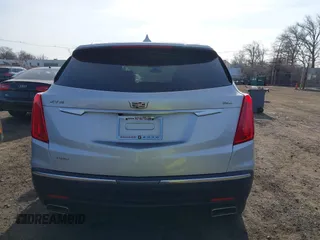 2019 Cadillac XT5 Premium Luxury AWD z VIN 1GYKNFRS2KZ227166, wystawiony jako IAAI lot #41786410 z przebiegiem 99 576 mil mil oraz . Historia ofert i sprzedaży dostępna na DreamBid. Obrazek 16.