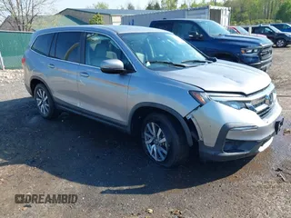 2020 Honda Pilot EX-L z VIN 5FNYF6H57LB059699, wystawiony jako IAAI lot #42026669 z przebiegiem 46 906 mil mil oraz . Historia ofert i sprzedaży dostępna na DreamBid. Obrazek 1.