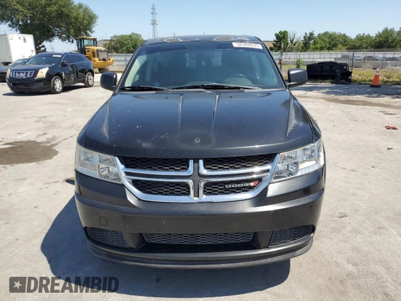 2013 Dodge Journey American Value with VIN 3C4PDCAB6DT709996, listed as a Copart auction lot 52362635 with 104,808 mi miles and Salvage Title. Bid and sale history available at DreamBid. Image 5.