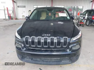 2015 Jeep Cherokee Sport with VIN 1C4PJLAB2FW539397, listed as a IAAI auction lot 42156576 with 120,409 mi miles. Bid and sale history available at carsss.com. Image 6.