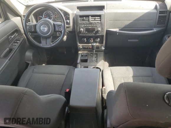 2011 Jeep Liberty Sport with VIN 1J4PN2GK7BW585608, listed as a Copart auction lot 61379875 with 144,904 mi miles and Salvage title. Bid and sale history available at DreamBid. Image 8.