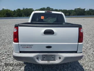2002 Ford Explorer Sport Trac Value with VIN 1FMZU67E12UB93878, listed as a Copart auction lot 56306785 with 159,476 mi miles and Salvage title. Bid and sale history available at DreamBid. Image 6.