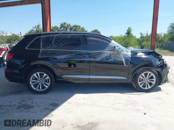 2017 Audi Q7 Premium Plus with VIN WA1LHAF75HD040203, listed as a IAAI auction lot 42064687 with 100,845 mi miles and . Bid and sale history available at DreamBid. Image 13.