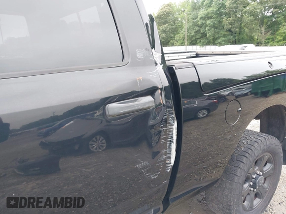 2014 Ram 2500 Big Horn with VIN 3C6UR5DJ8EG208290, listed as a IAAI auction lot 42336027 with 106,514 mi miles and . Bid and sale history available at DreamBid. Image 12.
