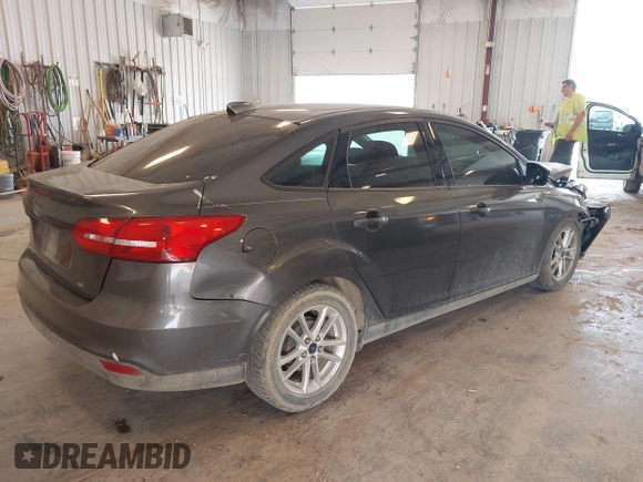 2015 Ford Focus SE with VIN 1FADP3F23FL216154, listed as a IAAI auction lot 42411857 with 127,612 mi miles and . Bid and sale history available at DreamBid. Image 4.