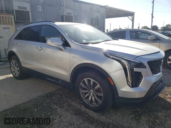 2021 Cadillac XT4 FWD Sport with VIN 1GYFZER41MF006261, listed as a Copart auction lot 45553664 with 14,402 mi miles and . Bid and sale history available at DreamBid. Image 4.