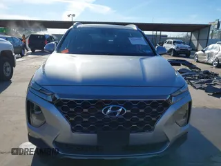 2020 Hyundai Santa Fe Limited with VIN 5NMS53AA6LH301900, listed as a IAAI auction lot 41295933 with 92,359 mi miles and . Bid and sale history available at DreamBid. Image 13.