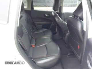 2020 Jeep Compass Trailhawk z VIN 3C4NJDDB8LT195584, wystawiony jako IAAI lot #42295678 z przebiegiem 99 762 mil mil oraz . Historia ofert i sprzedaży dostępna na DreamBid. Obrazek 8.