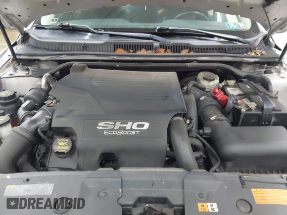 2012 Ford Taurus SHO с VIN 1FAHP2KTXCG107494, выставлен на аукционе IAAI как лот 41951659 с пробегом 128 015 миль миль и . История ставок и продаж доступна на DreamBid. Изображение 10.