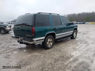 1996 Chevrolet Tahoe with VIN 1GNEK13R1TJ388054, listed as a IAAI auction lot 41368047 with 155,138 mi miles. Bid and sale history available at carsss.com. Image 4.