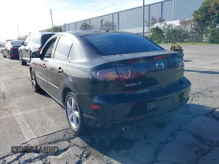 2005 Mazda 3 s with VIN JM1BK323751254849, listed as a IAAI auction lot 41645553 with 241,527 mi miles. Bid and sale history available at carsss.com. Image 3.