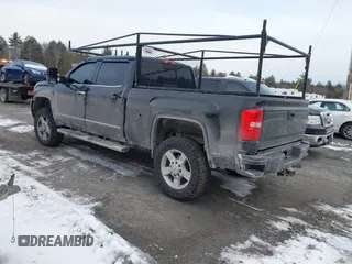 2016 GMC Sierra 2500HD Denali z VIN 1GT12UE81GF128498, wystawiony jako IAAI lot #41346398 z przebiegiem 164 532 mil mil oraz . Historia ofert i sprzedaży dostępna na DreamBid. Obrazek 3.