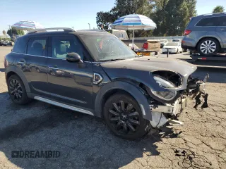 2018 MINI Countryman Cooper S with VIN WMZYT3C39J3E93214, listed as a Copart auction lot 77655444 with 101,401 mi miles and Salvage Title. Bid and sale history available at carsss.com. Image 4.