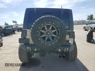 2016 Jeep Wrangler Unlimited Rubicon z VIN 1C4HJWFGXGL236560, wystawiony jako Copart lot #57528355 z przebiegiem 64 634 mil mil oraz Szkoda całkowita • Salvage title. Historia ofert i sprzedaży dostępna na DreamBid. Obrazek 6.
