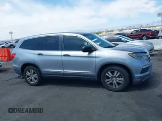 2016 Honda Pilot LX with VIN 5FNYF5H10GB044006, listed as a IAAI auction lot 42075404 with 129,642 mi miles and . Bid and sale history available at DreamBid. Image 13.