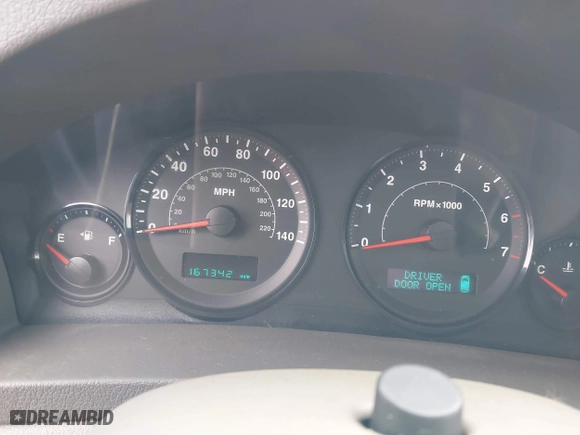 2005 Jeep Grand Cherokee Laredo with VIN 1J4HR48N35C647637, listed as a IAAI auction lot 38514345 with 167,342 mi miles. Bid and sale history available at carsss.com. Image 7.