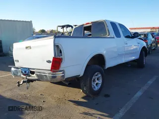 1999 Ford F-150 XL с VIN 1FTRX18L0XKB29703, выставлен на аукционе IAAI как лот 41644163 с пробегом Не указан миль и . История ставок и продаж доступна на DreamBid. Изображение 4.