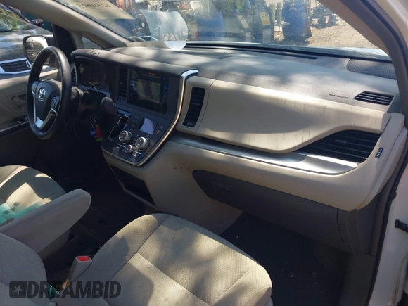 2015 Toyota Sienna L with VIN 5TDZK3DCXFS640245, listed as a IAAI auction lot 42310815 with 76,260 mi miles and . Bid and sale history available at DreamBid. Image 5.