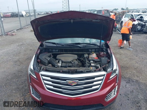 2018 Cadillac XT5 Premium Luxury FWD z VIN 1GYKNERS2JZ242842, wystawiony jako IAAI lot #42297159 z przebiegiem 72 008 mil mil oraz . Historia ofert i sprzedaży dostępna na DreamBid. Obrazek 10.