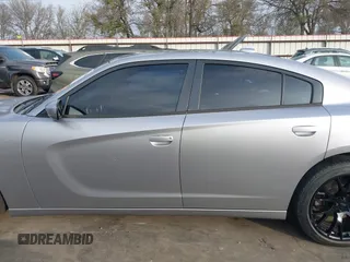 2015 Dodge Charger SXT with VIN 2C3CDXHG4FH884058, listed as a IAAI auction lot 41724894 with 202,701 mi miles and . Bid and sale history available at DreamBid. Image 15.