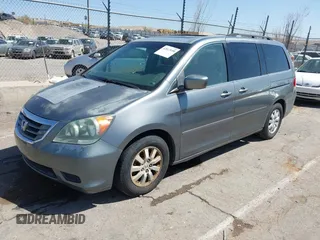 2009 Honda Odyssey EX-L with VIN 5FNRL38619B401970, listed as a IAAI auction lot 42017650 with 137,109 mi miles. Bid and sale history available at carsss.com. Image 2.