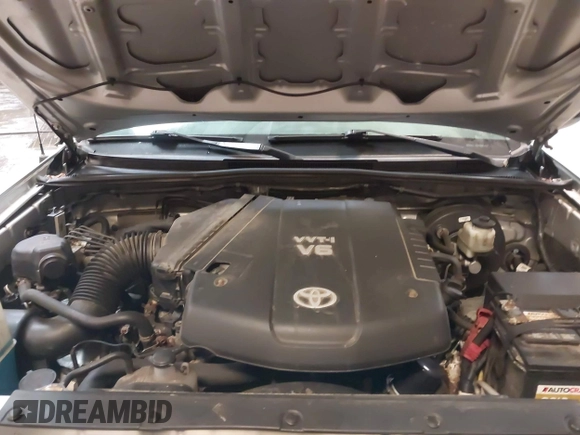 2013 Toyota Tacoma with VIN 5TFUU4EN0DX071116, listed as a IAAI auction lot 41647546 with 243,898 mi miles and . Bid and sale history available at DreamBid. Image 10.