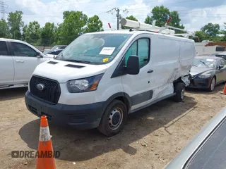 2024 Ford Transit Cargo with VIN 1FTBR1Y89RKA01132, listed as a IAAI auction lot 42668811 with 31,666 mi miles and . Bid and sale history available at DreamBid. Image 17.