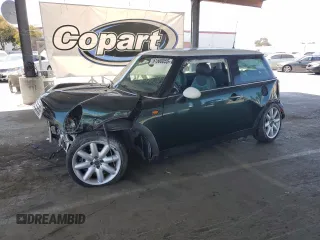 2003 MINI Hardtop with VIN WMWRC33403TE17958, listed as a Copart auction lot 61500055 with 96,476 mi miles and Salvage title. Bid and sale history available at DreamBid. Image 1.