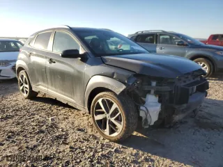 2021 Hyundai Kona Ultimate with VIN KM8K5CA50MU686931, listed as a Copart auction lot 46915445 with 43,612 mi miles and Salvage Title. Bid and sale history available at carsss.com. Image 4.