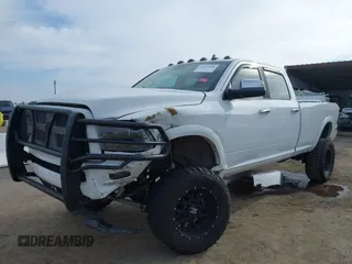 2014 Ram 2500 with VIN 3C6TR5KT3EG309771, listed as a IAAI auction lot 41213964 with 136,617 mi miles and . Bid and sale history available at DreamBid. Image 6.