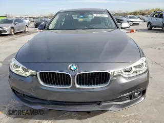 2018 BMW 3 Series 320i z VIN WBA8A9C55JAH14312, wystawiony jako Copart lot #49729535 z przebiegiem 54 867 mil mil oraz Czysty tytuł • Clean title. Historia ofert i sprzedaży dostępna na DreamBid. Obrazek 5.