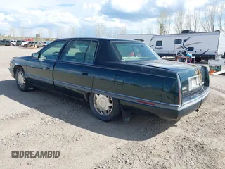 1995 Cadillac Concours z VIN 1G6KF52YXSU302434, wystawiony jako IAAI lot #42231281 z przebiegiem 153 236 mil mil oraz . Historia ofert i sprzedaży dostępna na DreamBid. Obrazek 3.