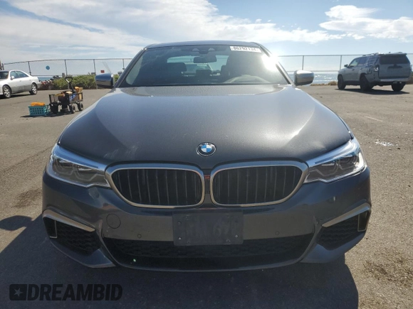 2019 BMW 5 Series M550i xDrive with VIN WBAJB9C57KB289036, listed as a Copart auction lot 86292134 with 28,103 mi miles and Salvage title. Bid and sale history available at DreamBid. Image 5.