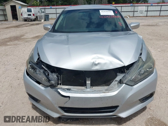 2017 Nissan Altima S z VIN 1N4AL3AP7HC275003, wystawiony jako IAAI lot #42420564 z przebiegiem 127 566 mil mil oraz . Historia ofert i sprzedaży dostępna na DreamBid. Obrazek 13.