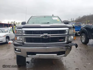 2015 Chevrolet Silverado 1500 LT with VIN 3GCUKRECXFG104194, listed as a IAAI auction lot 41029090 with 149,530 mi miles. Bid and sale history available at carsss.com. Image 13.