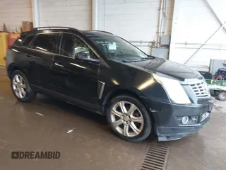 2014 Cadillac SRX Performance Collection with VIN 3GYFNFE39ES659013, listed as a IAAI auction lot 42264069 with 129,122 mi miles and . Bid and sale history available at DreamBid. Image 1.