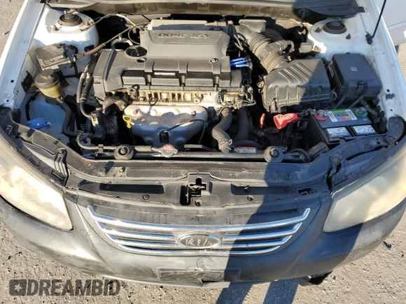 2009 Kia Spectra EX z VIN KNAFE222395623700, wystawiony jako Copart lot #86279424 z przebiegiem 195 991 mil mil oraz Szkoda całkowita • Salvage title. Historia ofert i sprzedaży dostępna na DreamBid. Obrazek 12.