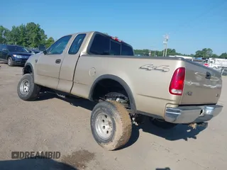 2000 Ford F-150 XL z VIN 1FTRX18W7YNA73804, wystawiony jako IAAI lot #42779753 z przebiegiem 228 666 mil mil oraz . Historia ofert i sprzedaży dostępna na DreamBid. Obrazek 3.