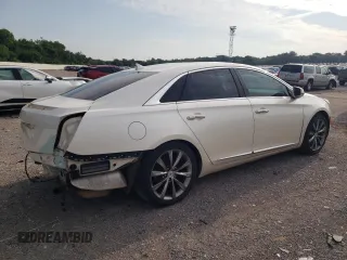 2013 Cadillac XTS Luxury with VIN 2G61P5S37D9186395, listed as a Copart auction lot 56859015 with 132,458 mi miles and Salvage title. Bid and sale history available at DreamBid. Image 3.