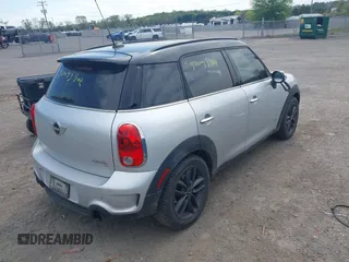 2012 MINI Countryman S with VIN WMWZC5C56CWM13283, listed as a IAAI auction lot 42093902 with 230,000 mi miles and . Bid and sale history available at DreamBid. Image 4.