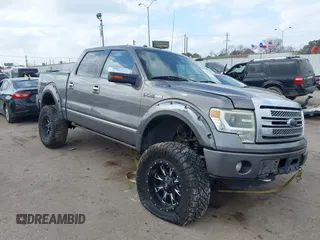 2014 Ford F-150 XL with VIN 1FTFW1EF2EFC42305, listed as a IAAI auction lot 41399663 with 167,809 mi miles. Bid and sale history available at carsss.com. Image 1.
